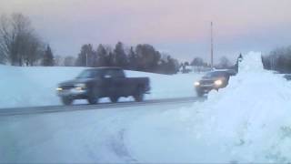 Driving Through The Snow Covered Roads