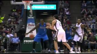 John Henson posterizes Jae Crawder