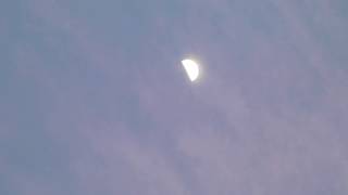 Clouds behind the moon