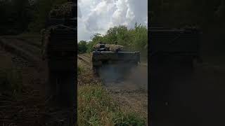 Ukrainian Leopard 2A4 fitted with Kontakt-1 and Barracuda IR mitigation netting.