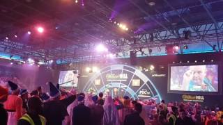 Phil Taylor checks out to win match at World Championship