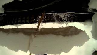 Snow falling from roof in slow motion - GoPro Hero3 Black Edition