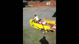 Quinn Driving the Cushman