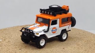 Johnny Lightning Gulf Land Cruiser 4X4 Gulf racing // MIJO Exclusive Orange & White // 1/64 SHOWCASE