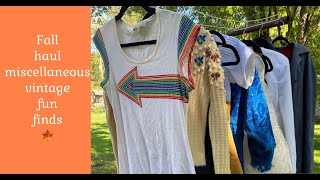 Miscellaneous vintage clothing fall haul from a wool nurses cape to a poly Sears men’s jumpsuit