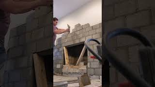 indoor Fire Place  rebuild Block the Stone Faced Masonry  workers