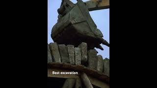 Best excavator laying rock doom wall