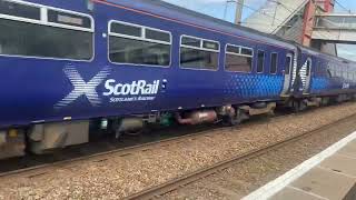 Class 156442 went passed Prestwick International Airport station