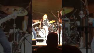 Sheryl Crow on harmonica