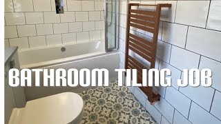 Bathroom fitting with white tiles brick effect with vanity units