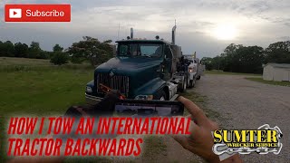 How I tow an International tractor backwards