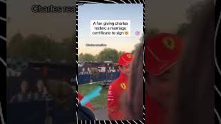 A fan gave Charles Leclerc a marriage certificate to Sign