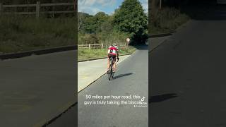 Cyclist riding down dual carriageway