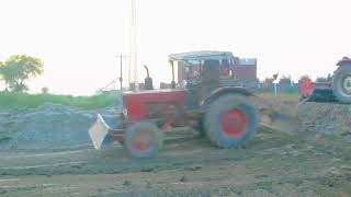 Belarus tractor/dragging past crush soil/best performance