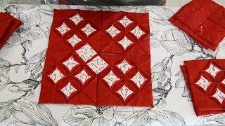 Hand quilting cathedral windows