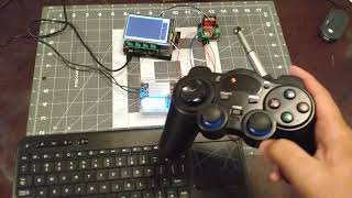 Wireless game controller controlling a 12v linear actuator with raspberry pi with a buck converter.