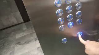 3 Otis elevators at Maneeya Center Bangkok Thailand (high rise)