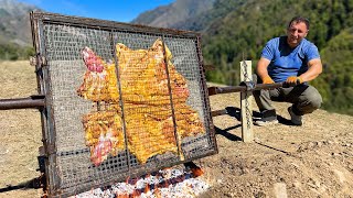 Unexplored Wilderness: Chef Tavakkul Grilling Lamb Over A Coal Pit