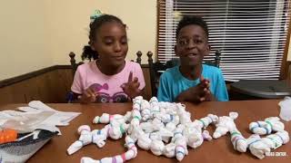 Tie dying face masks with the Munson Marvels sibling duo