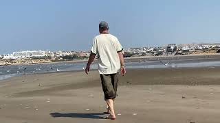 WALKING BY THE BEACH