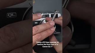 Using a DYI lens spanner to remove the front lens on a Canon Canonet QL17