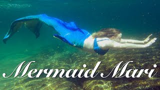 Mermaid Mari swimming over beautiful ocean floor - relaxing underwater footage