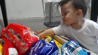 Grocery check by baby Uno