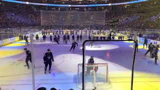 Toronto Maple Leafs skate before national anthem.