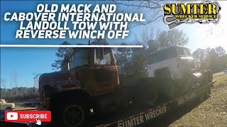 Old Mack and Cabover International Landoll tow with Reverse winch off