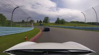 Watkins Glen Lapping in a GTB1 Porsche Cayman with lots of traffic.