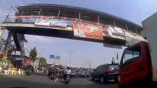 Jalan Jalan menuju arah Kampung Melayu lewat jalan kol Sugiono BKT