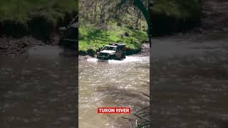 Jeep Wrangler crossing the Turon River