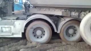 Semi Truck Volvo Stuck in Mud