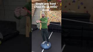 Single Arm Band Chest Fly on BOSU dome