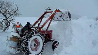 Massey Ferguson 65 tractor clears more snow