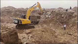 JCB 215 Nxt Excavator Truck loading for crusher