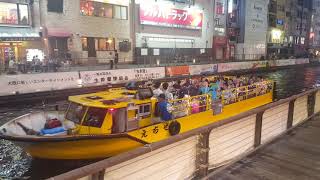 Night boat ride in Osaka, Japan. Live music