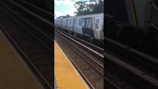 R211A (A) train Leaves Broad Channel