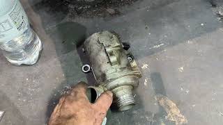 BMW E90 electric water pump thermostat layout removal tips.