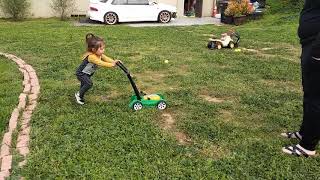 Alex mows the lawn