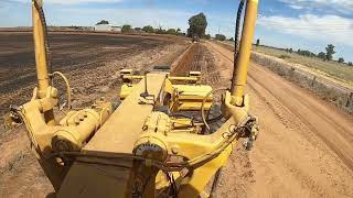 323.Cat grader working on irrigation