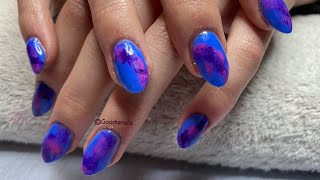 Blue nails with gel polish smoke