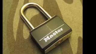 Small master lock laminated brass padlock picked open easily