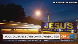 Man wants city to compensate him over 'Jesus Welcomes You to Hawkins' sign