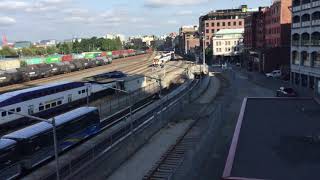 West Coast Express train pulling out of Waterfront Station with Cab Car 103 in tow