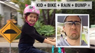 Kid + Bike + Rain + Bump = Confused Dad