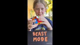 Little girl goes beast mode on Rubik's cube!