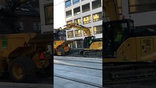 Electric / Battery powered Caterpillar 310 excavator working on an urban work project in Oslo.