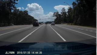 Person not paying attention almost runs red light