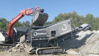 Kelowna's TNT crushing concrete w/ rebar using our Komplet Krokodile Tracked fed by our Linkbelt 145